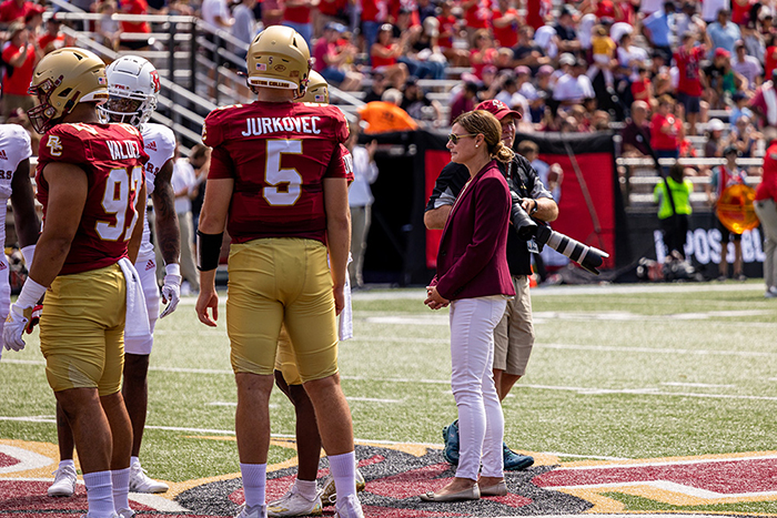 Dr. Kelly McInnis on the field at Alumni Stadium at Boston College
